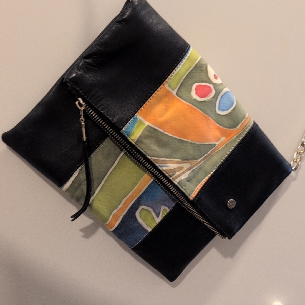 Black and Orange Crossbody Bag with Geometric Design